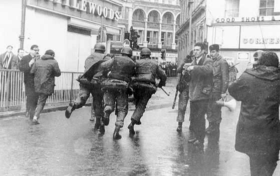 British Army snatch squads in operation after a confrontation with Nationalists in William Street early in 1970. Such confrontations were by now becoming commonplace.